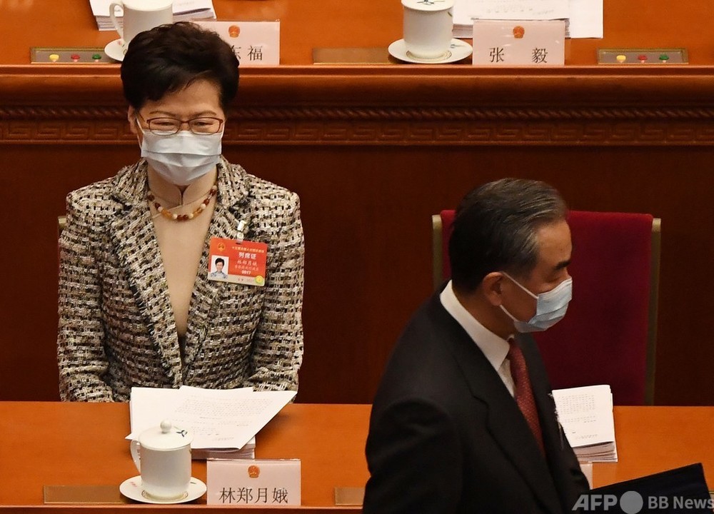 香港の選挙制度見直し、親中派委員会が候補者指名へ 全人代