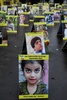 フランス・パリで行われたイランへの抗議行動で設置された犠牲者の写真（2022年12月6日撮影、資料写真）。(c)JULIEN DE ROSA  / AFP