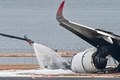 海上保安庁の航空機と衝突した日本航空（JAL）の旅客機。東京国際（羽田）空港で（2024年1月3日撮影）。(c)Richard A. Brooks / AFP