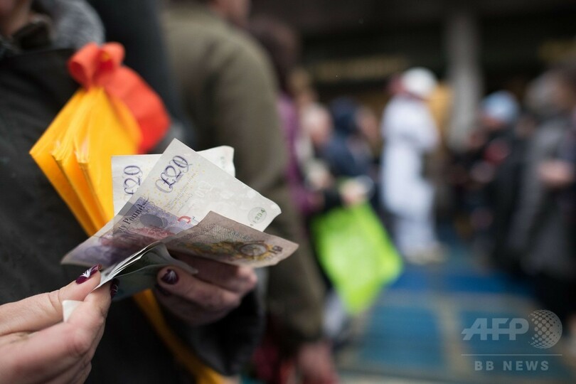 ロンドン史の一端、イブ恒例の肉の競り売り 今年で見納め？