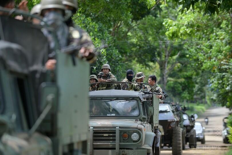 フィリピン南部で軍とIS系武装勢力が市街戦、市民に犠牲か