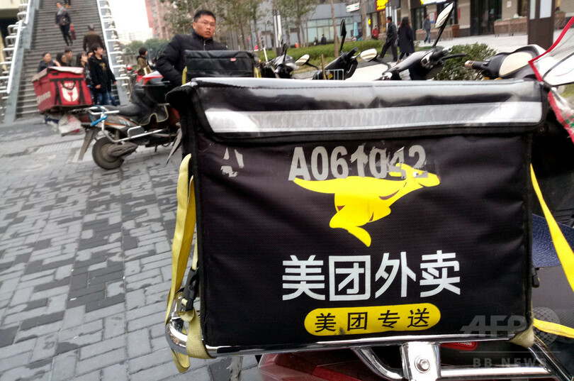 食と配車の相乗効果狙う 中国「O2O」大手の美団、上海で配車サービス開始