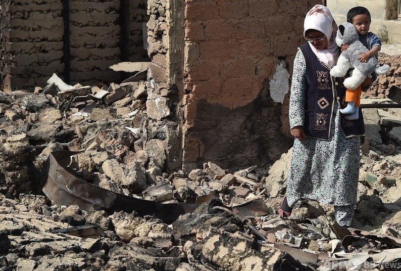 【今日の1枚】「ワンちゃんは私が守る」停戦後のキルギス国境地帯