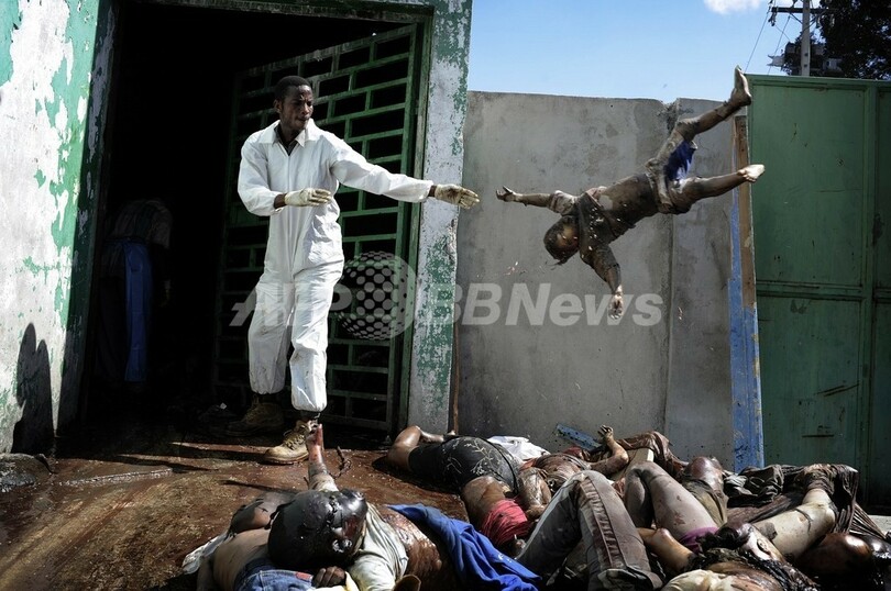 世界報道写真大賞、「耳と鼻をそぎ落とされたアフガン女性」に