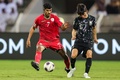 2026年サッカーW杯北中米大会アジア最終予選、グループB、オマーン対韓国。オマーンのイサーム・アルサビ（左）とボールを競る韓国の黄仁範（2024年9月10日撮影）。(c)Haitham AL-SHUKAIRI/ AFP