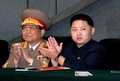朝鮮労働党創建65周年を祝って平壌（Pyongyang）の5.1競技場（メーデースタジアム、May Day Stadium）で開かれた大マスゲーム「アリラン」を観覧する金正日（キム・ジョンイル、Kim Jong-Il）総書記の三男、金正恩（キム・ジョンウン、Kim Jong-Un）氏（2010年10月9日撮影、2010年10月10日朝鮮中央通信配信、資料写真）。(c)AFP/KCNA via KNS