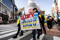東京都内で行われたロシアのウクライナ侵攻に抗議するデモ（2022年3月5日撮影）。(c)Behrouz MEHRI / AFP