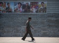 北朝鮮の首都・平壌で開かれた第15回平壌国際映画祭の会場周辺に貼られた映画のポスター（2016年9月23日撮影）。(c)AFP/Ed Jones