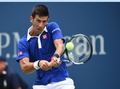 全米オープンテニス、男子シングルス1回戦。リターンを狙うノバク・ジョコビッチ（2015年8月31日撮影）。(c)AFP/TIMOTHY  A. CLARY