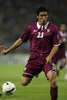 ドリブルで仕掛けるカタールの%%Andres Quintana%%。(c)AFP/QUANG MINH