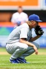15MLB、ニューヨーク・メッツ対ロサンゼルス・ドジャース。3回に失点し、落胆するロサンゼルス・ドジャースのザック・グレインキー（2015年7月26日撮影）。(c)AFP/Getty Images/Mike Stobe