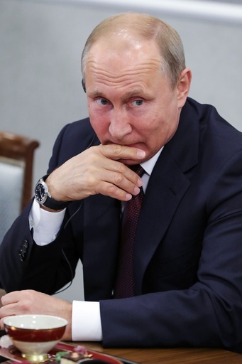 プーチン氏、大統領任期満了後の首相再就任を示唆