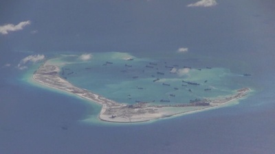 米軍偵察機「追い払った」、中国が勝利宣言 南シナ海の人工島問題