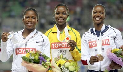 女子100メートルのメダル授与式が行われる