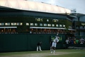 テニス、ウィンブルドン選手権（The Championships Wimbledon 2014）男子シングルス3回戦。サーブを放つ錦織圭（Kei Nishikori、2014年6月28日撮影）。(c)AFP/ANDREW YATES