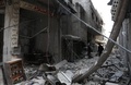 シリアの首都ダマスカス近郊の反体制派支配地区、東グータで損壊した建物（2018年2月25日撮影）。(c)AFP PHOTO / ABDULMONAM EAS