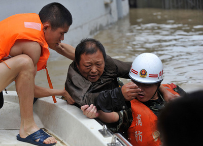 中国、豪雨で28人死亡・66人不明 被災300万人超