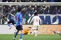 2022年サッカーW杯カタール大会アジア最終予選グループB、日本対ベトナム。ゴールを決める吉田麻也（左、2022年3月29日撮影）。(c)Charly TRIBALLEAU / AFP