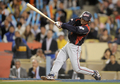 第2回ワールド・ベースボール・クラシック（%%2009 World Baseball Classic%%）決勝、韓国戦で3回に適時打を放つ日本の小笠原道大（%%Michihiro Ogasawara%%）。（2009年3月23日撮影）(c)AFP/Getty Images/Kevork Djansezian