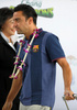 スペイン1部リーグのFCバルセロナ（FC Barcelona）は5日、タイのドンムアン空港（Don Muang Airport）に到着した。

FCバルセロナは7日にバンコク（Bangkok）のラジャマンガラ・スタジアム（Rajamangala Stadium）でタイ代表と親善試合を行う。

空港に到着したシャビ・エルナンデス（Xavi Hernandez、2013年8月6日撮影）。(c)AFP/PORNCHAI KITTIWONGSAKUL