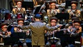 ロシア・モスクワで開催の国際軍隊音楽祭「スパスカヤ塔」で、パフォーマンスを披露する北朝鮮の朝鮮人民軍の合唱団「功勲国家合唱団」（2019年8月26日撮影）。(c)Alexander NEMENOV / AFP