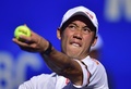 テニス、メキシコ・オープン、男子シングルス1回戦。サーブトスを上げる錦織圭（2018年2月27日撮影）。(c)AFP PHOTO / PEDRO PARDO