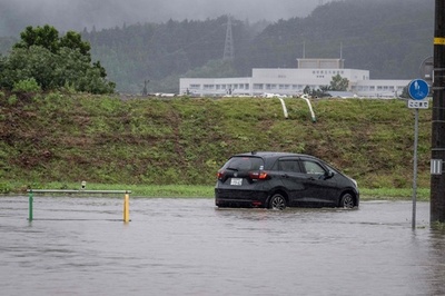 Tropical Storm Maria hits Japan with record rain