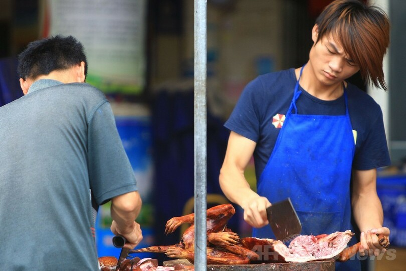 中国「犬肉祭」に抗議、地元住民反発で取引量増も