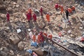 救助活動が続く土砂崩れの現場（2019年3月17日撮影）。(c)CNS/韋亮