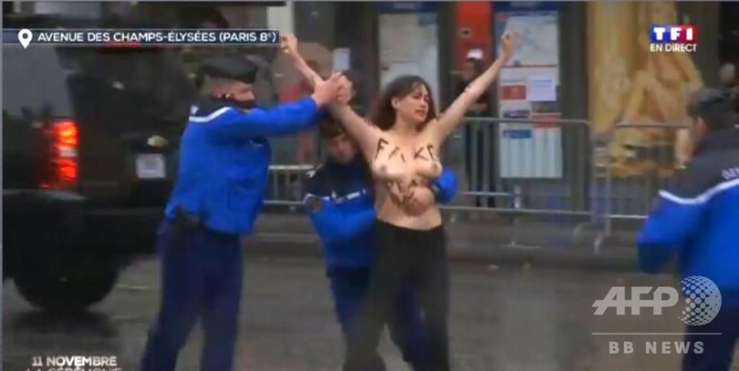 トランプ大統領の車列にトップレス女性が接近、一時停止 仏パリ