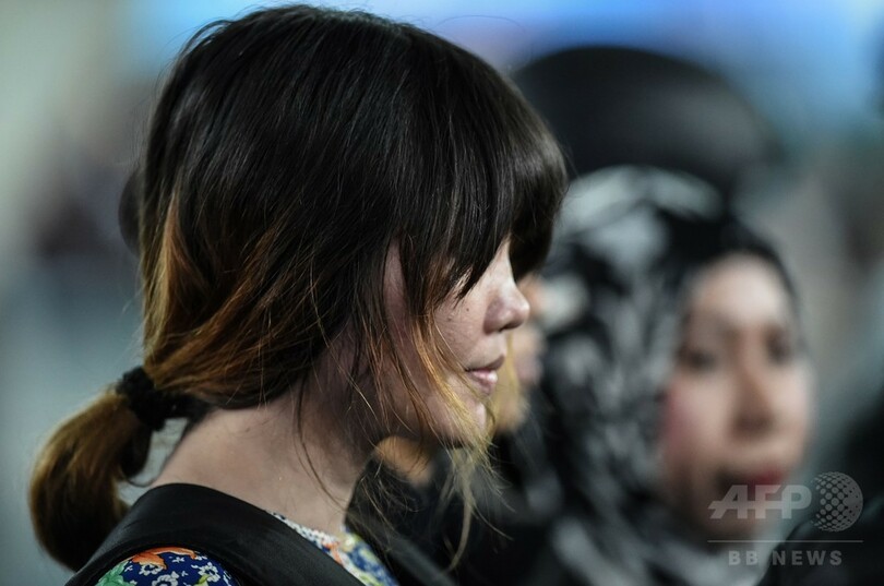 金正男氏の暗殺事件、被告2人立ち会い現場検証 マレーシア