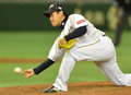 第3回ワールド・ベースボール・クラシック（2013 World Baseball Classic、WBC）は12日、東京で2次ラウンドの1位決定戦が行われ、大会3連覇を狙う日本は10-6でオランダを下し、2次ラウンド首位通過を決めた。

9回に抑えとして登板する日本の牧田和久（Kazuhisa Makita、2013年3月12日撮影）。(c)AFP/KAZUHIRO NOGI