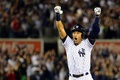 14MLB、ニューヨーク・ヤンキース（New York Yankees）対ボルティモア・オリオールズ（Baltimore Orioles）。9回に適時打を放ち、歓喜するニューヨーク・ヤンキースのデレク・ジーター（Derek Jeter、2014年9月25日撮影）。(c)AFP/Getty Images/Al Bello