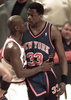 Chicago Bulls guard Michael Jordan(L) tries to calm down New York Knicks center Patrick Ewing after Ewing was called for a technical foul 07 May during the fourth quarter of game two of the Eastern Conference semifinals at the United Center in  Chicago. (c)AFP/Vincent LAFORET