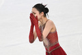 北京冬季五輪フィギュアスケート団体戦、女子フリースケーティングの演技を終え、涙を流す中国の朱易（2022年2月7日撮影）。(c)Anne-Christine POUJOULAT / AFP