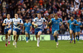 ラグビーシックスネイションズ（Six Nations Rugby 2013）は9日、第2週の2試合が行われ、スコットランドが34-10でイタリアを下した。

ボールを運ぶスコットランドのスチュアート・ホッグ（Stuart Hogg、中央、2013年2月9日撮影）。(c)AFP/IAN MACNICOL