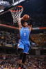 13-14NBA、インディアナ・ペイサーズ（Indiana Pacers）対オクラホマシティ・サンダー（Oklahoma City Thunder）。ダンクシュートを狙うオクラホマシティ・サンダーのラッセル・ウエストブルック（Russell Westbrook、2014年4月13日撮影）。(c)AFP/Getty Images/NBAE/Gary Dineen