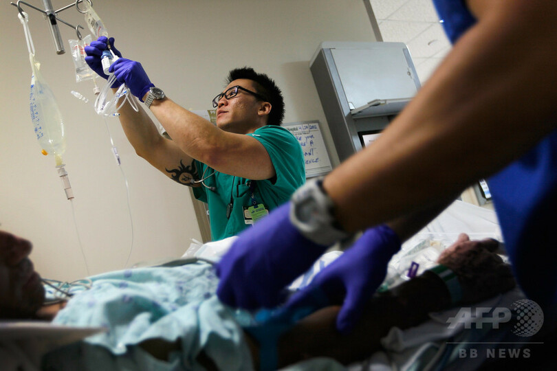 世界のがん死者、金融危機で50万人増加か 英研究