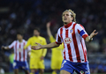 10-11スペイン1部リーグ第27節、アトレティコ・マドリード（Atletico de Madrid）対ビジャレアル（Villarreal CF）。後半27分に得点を挙げ歓喜するアトレティコ・マドリードのディエゴ・フォルラン（Diego Forlan、2011年3月5日撮影）。(c)AFP/PIERRE-PHILIPPE MARCOU