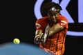 全豪オープンテニス、男子シングルス準々決勝。リターンを打つガエル・モンフィス（2016年1月27日撮影）。(c)AFP/PAUL CROCK