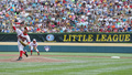 第67回リトルリーグ世界選手権大会（2013 Little League World Series）は25日、米ペンシルベニア（Pennsylvania）州ウィリアムズポート（Willamsport）で決勝が行われ、日本代表の武蔵府中（Musashi Fuchu）が6-4で米国代表のカリフォルニア（California）州チュラビスタ（Chula Vista）に勝利し、世界一に輝いた。

先発登板した武蔵府中の石田和輝（Kazuki Ishida、2013年8月25日撮影）。(c)AFP/Getty Images/Rob Carr