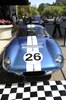 元レーシングドライバーでレーシングカーデザイナーのキャロル・シェルビー（Carroll Shelby）氏がつくった伝説のレーシングカー「シェルビー・コブラ・デイトナクーペ（Shelby Daytona Cobra Coupe CSX260）」が、オークションに出品されるのを前にニューヨーク（New York）の老舗ホテル、プラザホテル（Plaza Hotel）前に展示された。

　シェルビー・コブラ・デイトナクーペは6台のみ製造され、1965年に米国産レースカーとして初めて「国際マニュファクチャラーズ選手権（現在のスポーツカー世界選手権）」でフェラーリ（Ferrari）に勝利した。

　オークションは5月15日に米インディアナ（Indiana）州インディアナポリス（Indianapolis）で開催され、自動車の史上最高価格となる推計1000-1500万ドル（約10-15億円）の値段がつくとみられている（2009年4月28日撮影）。(c)AFP/Emmanuel Dunand