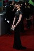 英国アカデミー賞（British Academy Film Awards）授賞式に出席した女優アン・ハサウェイ（Anne Hathaway、2013年2月10日撮影）。(c)AFP/ANDREW COWIE