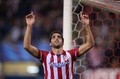 サッカー欧州チャンピオンズリーグ2013-14（UEFA Champions League 2013-14）グループG第4節、アトレティコ・マドリード（Atletico de Madrid）対オーストリア・ウィーン（Austria Vienna）。得点を挙げ歓喜するアトレティコ・マドリードのラウル・ガルシア（Raul Garcia、2013年11月6日撮影）。(c)AFP/PIERRE-PHILIPPE MARCOU