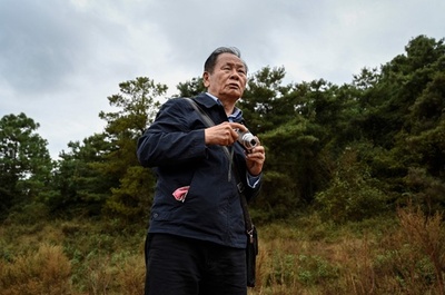 恩恵受けた湖を汚染から救いたい 闘いに一生ささげる中国の活動家