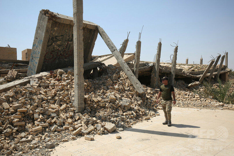 フセイン元イラク大統領の遺体はどこに？ がれきと化した霊廟で深まる謎