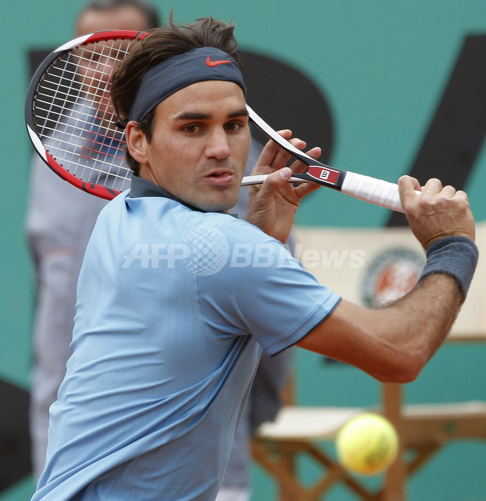 フェデラーが全仏オープン初優勝 、生涯グランドスラム達成 写真