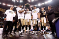 09NFLプレーオフ、ナショナル・カンファレンス（NFC）決勝、ニューオーリンズ・セインツ（%%New Orleans Saints%%）対ミネソタ・バイキングス（%%Minnesota Vikings%%）。試合はセインツが31-28で勝利し、チーム創設以来初のスーパーボウル進出を決めた。写真はスーパーボウル進出を決めて歓喜するセインツの選手。（2010年1月24日撮影）(c)AFP/Getty Images/Chris Graythen