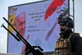イラク首都バグダッドで警備にあたるイラク治安部隊（2021年3月5日撮影）。(c)AHMAD AL-RUBAYE / AFP