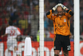 失点を喫し頭を抱えるリバプールのGKホセ・マヌエル・レイナ（%%Jose Manuel Reina%%）。(c)AFP/PAUL ELLIS